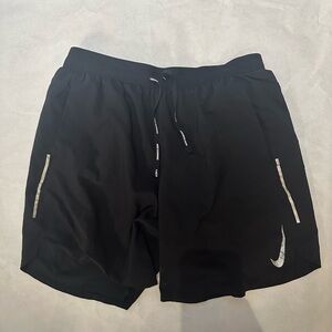 Nike Men's Black Athletic Shorts with Silver Accents